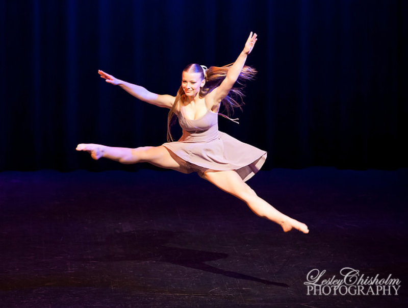 Dancer performing on stage at the 2025 festival in Trail, BC